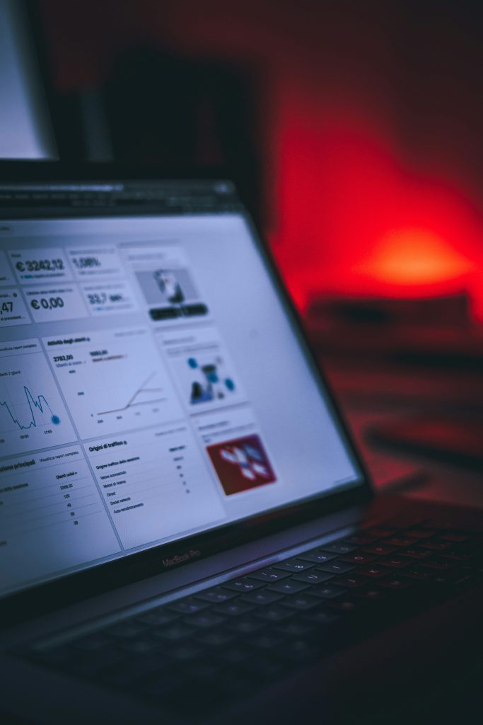 Pictured: a laptop, screen displaying analytics